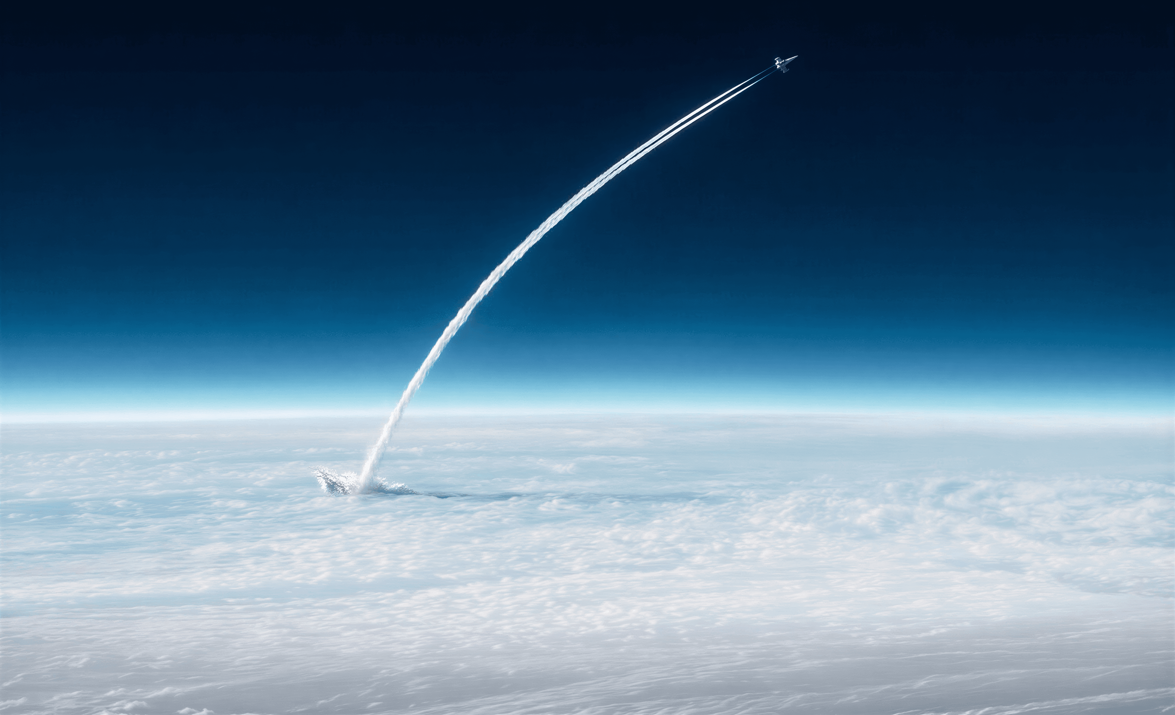 Rocket launching from above the clouds into space